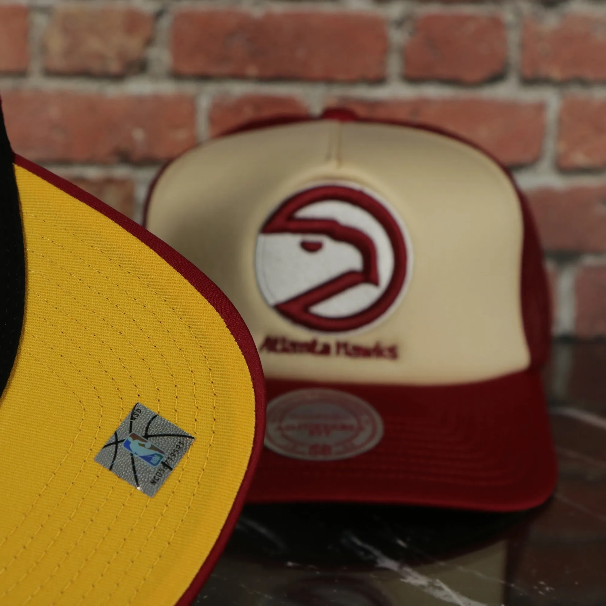 Atlanta Hawks Vintage Hawks wordmark Yellow Bottom 2-Tone Foam Trucker Hat | Red/Off-White Mitchell and Ness Hat