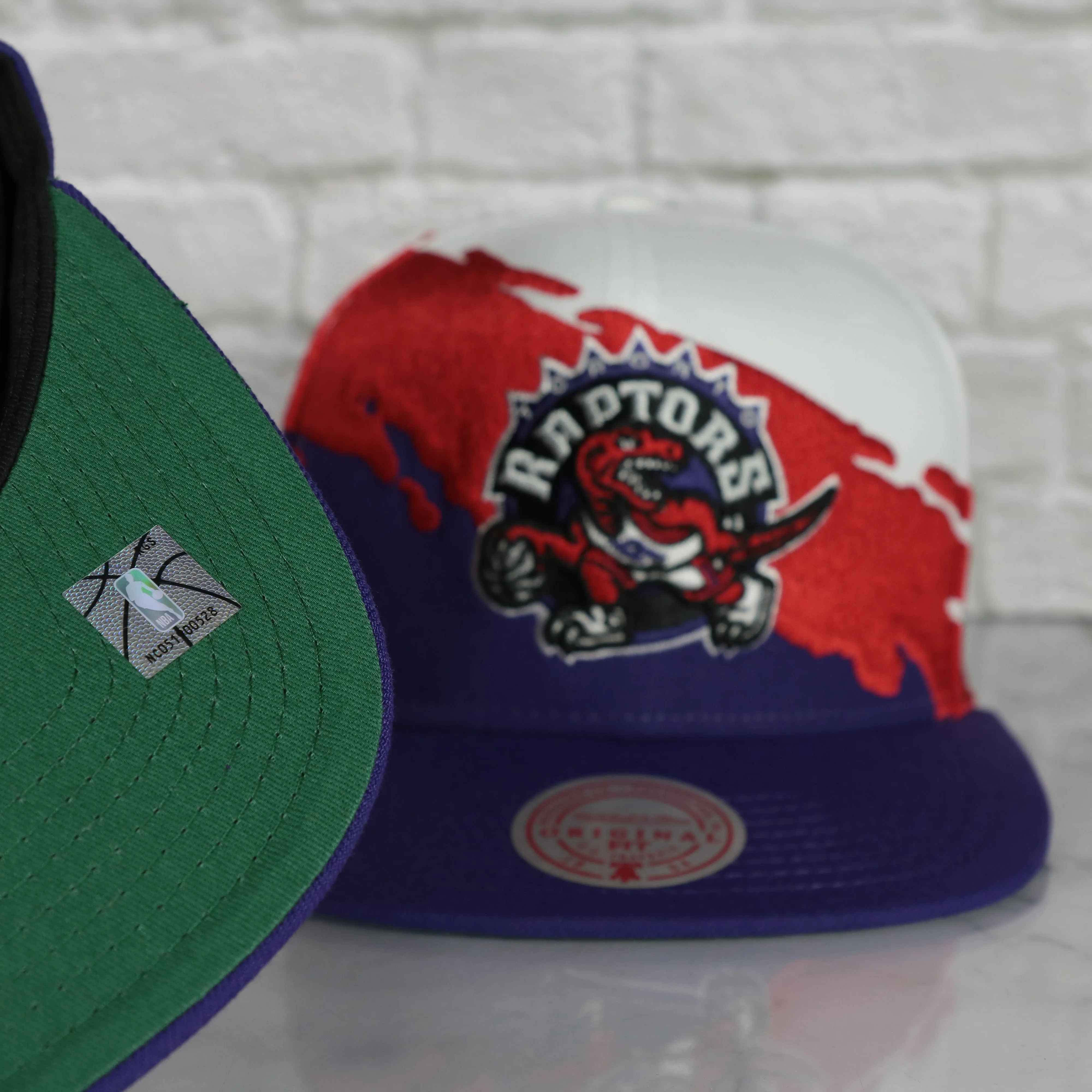 Toronto Raptors Vintage Retro NBA Paintbrush Mitchell and Ness Snapback Hat | Purple/White/Red